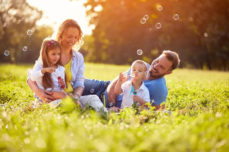 Happy parents with their children