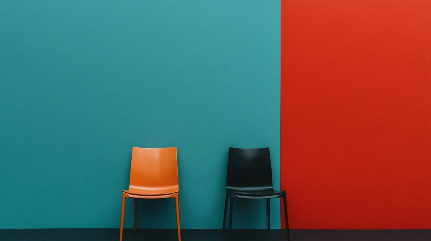 two chairs against a wall